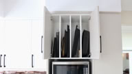 Studio 28 Interio Design Wellington Zealand. Creating wow interiors that are easy on the eye. Details of bakeware cupboard.