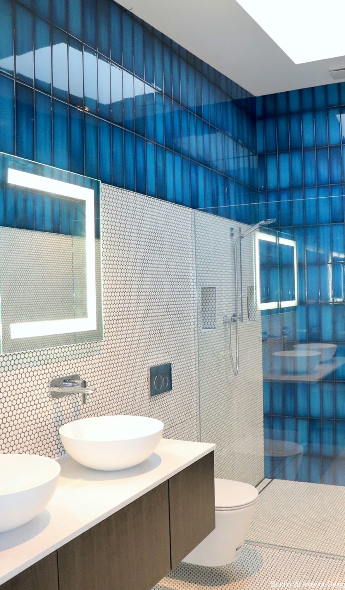 Bathroom ensuite with blue tiles