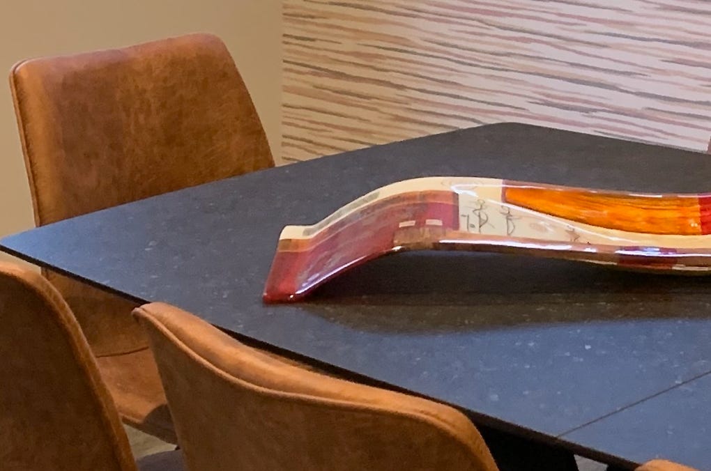 Studio 28 Interio Design Wellington Zealand. Creating wow interiors that are easy on the eye. Dinning table and chairs with decorative wallpaper behind.